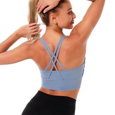 The EMES SHOP sports bra is detailed with a scoop neckline. Features double racerback straps that crossover the open back. This lightweight. breathable. quick-drying sports bra is perfect for your next gym session or yoga class.MATERIAL:85% Nylon 15% SpandexMEASUREMENTS:Small : 4-6 Waist: 25-26.5 in Chest: 33-34.5 in Medium : 6-8 Waist: 26.5-28 in Chest: 34.5-36 in Large : 8-10 Waist: 28-29.5 in Chest: 36-37.5 in X-Large : 10-12 Waist: 29.5-31 in Chest: 37.5-39 in Athleisure Strappy Sports Bra With Built-in Bra, Strappy Sports Bra With Built-in Bra, T-back Sports Bra With Straps For Workout, Compressive Cross Back Sports Bra With Built-in Bra, Racerback Sports Bra For Pilates, Sporty T-back Sports Bra For Gym, Racerback Activewear With Built-in Bra For Light Exercise, Functional T-back Sports Bra For Workout, Cross Back Sports Bra With Built-in Bra For Training