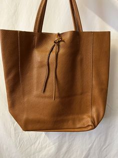 NEW High Class  Dark Tan (Brown) Women's Genuine Leather Bag, Leather Tote Bag, Gift Bag, Shoulder Bag Tried to show right colour in photos Approximate dimension size: L(TOP):41CM L(BOTTOM):28CM H:37CM W:13CM, The Handle approximately: 29 cm, Inner Pocket approximately: Length:16cm; Height:16cm At £60 Please add me to your favourite seller list Please check my shop which consist of the different fabrics such as wool, silk, jacquard, fabulous, exquisite fabrics, scarves and bags Will NOT take res Dark Tan Leather Bag For On-the-go, Brown Bag With Large Capacity For On-the-go, Brown Rectangular Hobo Bag For Daily Use, Brown Rectangular Hobo Bag With Removable Pouch, Large Capacity Brown Shoulder Bag For Daily Use, Brown Large Capacity Hobo Bag For Daily Use, Large Capacity Brown Hobo Bag For Daily Use, Everyday Brown Rectangular Shoulder Bag, Everyday Light Brown Rectangular Hobo Bag