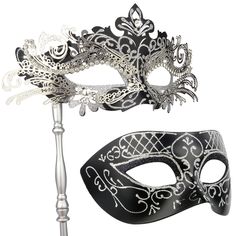 a masquerade mask and stick on a white background