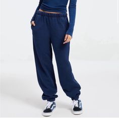 Good American Jeanius Jogger Sweatpants Indigo Size Medium Or Size 2 New With Tags Sporty Straight Leg Denim Pants, Sporty Wide Leg Denim Pants, Blue Cotton Relaxed Fit Joggers, Blue Relaxed Fit Cotton Joggers, High Rise Athleisure Bottoms With Elastic Waistband, Sporty Dark Wash Denim Bottoms, Casual Denim Blue Trousers, Casual Blue Pants For Fall, High Rise Blue Relaxed Fit Bottoms