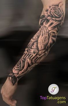 a man with a tattoo on his arm holding a rose and praying hands in front of him