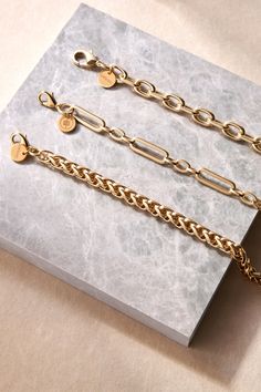 The Esmé bracelet is made from our thick chopin chain and fastened with a with lobster clasp. Material: Recycled Brass Plating: 14K Gold or Rhodium-silver Chain has a clear protective coating to prevent from quick wear and tarnishing. Chain measures: 7mm wide Clasp Measures: 15mm Available in the following Lengths: 6.5", 7", 8", 8.5", 9" Bracelet is handmade in the USA Timeless Link Bracelets With Chunky Chain, Timeless Chunky Link Chain Bracelet, Timeless Chain Link Bracelet With Lobster Clasp, Timeless Link Bracelet With Chunky Chain, Timeless Chunky Chain Link Bracelet, Timeless Chunky Chain Bracelet For Everyday, Timeless Everyday Chunky Chain Bracelet, Luxury Gold-tone Chunky Chain Bracelet, Classic Charm Bracelet With Lobster Clasp For Everyday