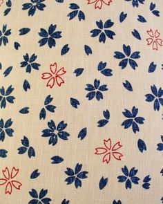 blue and red flowers on white fabric