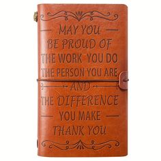 a brown leather journal with the words,'may you be proud of the work you do