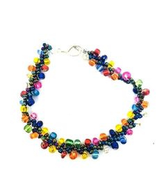 Add some color to your accessory collection with this stunning beaded bracelet. The striking combination of colorful beads gives it a unique and eye-catching look, perfect for any fashion-forward individual. The bracelet comes in two different sizes and is secured with a clasp closure for easy wear. Its charm type is a beautiful bead that adds an extra touch of elegance. Ideal for both casual and formal events, this bracelet is sure to make a statement. Rainbow Faceted Round Beads Bracelets, Multicolor Bangle Bracelet With Spacer Beads, Multicolor Beaded Chain Bracelet, Rainbow Crystal Bracelet With Colorful Round Beads, Colorful Beaded Chain Bracelets As Gift, Colorful Faceted Beaded Bracelets, Multicolor Czech Glass Crystal Bracelet With Spacer Beads, Multicolor Czech Glass Bracelet With Spacer Beads, Rainbow Faceted Beads Bracelets