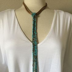 Artist Crystal Bead 20" Long 4 Strand Tassel Fashion Necklace Shades Of "Turquoise & Gold" Shining Crystal Beads. Handmade By Jamierocks. Easy To Open/Close Lobster Clasp Braided Leather Cord From Which Knotted Lavender Crystal Beads Form An 11" Tassel Necklace. 20" Necklace Length With An 11" Drop Bead Tassel An Incredible "Statement" Necklace Great To Dress Up Any Outfit Adjustable Blue Lariat Necklace, Blue Adjustable Lariat Necklace, Adjustable Beaded Lariat Necklace For Festivals, Adjustable Lariat Beaded Necklace For Beach, Bohemian Faceted Beads Necklace For Festival, Adjustable Multi-strand Beaded Lariat Necklace, Adjustable Lariat Necklace For Festivals, Colorful Beads Lariat Necklace For Beach, Adjustable Lariat Necklace With Dangling Round Beads