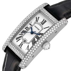 Cartier Tank Americaine White Gold Diamond Ladies Watch 2490. Automatic self-winding movement. 18k white gold case 22.0 x 41.0 mm. Octogonal crown set with an original Cartier factory diamond. Original Cartier factory double-row diamonds lug to lug. 18k white gold bezel with original Cartier factory double-row diamonds. Scratch resistant sapphire crystal. Silvered guilloche dial with black Roman numerals. Blued steel sword shaped hands. Secret Cartier signature at VII. Date window at 6 o'clock. Cartier Designer Diamond Watch, Designer Cartier Diamond Watch, Luxury Cartier Diamond Watch With Diamond Accents, Cartier Diamond Watch With Brilliant Cut, Designer Cartier Diamond Watch With Diamond Hour Markers, Cartier Diamond Watch With Diamond Hour Markers For Anniversary, Cartier Designer Diamond Watch With Diamond Hour Markers, Classic Diamond Watch With Palladium Hardware, Designer Diamond Watch With Polished Finish