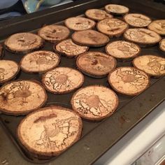 many slices of wood are on the stove top and ready to be cooked in the oven