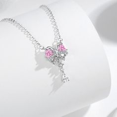 Crafted with 925 silver, this stunning necklace features a delicate pink butterfly heart and sparkling CZ diamonds. Made with superior materials, this necklace will add elegance and charm to any outfit. Perfect for any occasion, this necklace is a must-have for any jewelry collection. Tarnish proof Water proof Sleep / Nap proof Safe for sensitive skin Wear it while working out &showering Designed to wear 24/7 If there is no stock, the product will take 60 days to produce Please leave your usual Butterfly Heart, Flat Back Earrings, Feather Necklaces, Gold Bracelet Chain, Rose Gold Jewelry, Blue Zircon, Pink Butterfly, Stunning Necklace, Cz Diamond