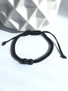 Adjustable friendship bracelet: ❤️In macrame ❤️1mm Heavy Duty Waxed Cotton Cord ❤️Pearl (2) natural black lava stone 8mm aromatherapy Bracelet length: Choose the wrist circumference in the option Interview: ❤️To enjoy the shine of your jewelry for longer, please clean it gently using the small velvet cloth included in your order. ❤️Store your jewelry in a dry place and in the small airtight aluminum bag included in your order. All jewelry is made to order. Adjustable 8mm Lava Stone Beaded Bracelets, Black Round Beads Wristband For Friendship, Black Wristband With Round Beads For Friendship, Adjustable Lava Stone Bead Jewelry, Minimalist Adjustable Lava Stone Jewelry, Casual Resizable Wristband As Gift, Adjustable Minimalist Wristband With Round Beads, Handmade Adjustable Lava Stone Beaded Bracelets, Minimalist Adjustable Wristband With Round Beads