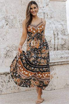 Black Retro Boho Floral Tassel Tie Maxi Dress Black Bohemian Dress With Boho Print, Black Bohemian V-neck Sundress, Black Bohemian Sundress For Vacation, Black Boho Print Dress For Festival, Black Flowy Boho Dress With Boho Print, Black Boho Print Maxi Length Dress, Black Boho Print Maxi Dress For Vacation, Black Bohemian Dress With Loose Fit, Black Flowy Bohemian Dress