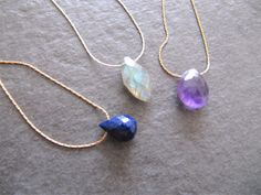 Minimalist gemstone drop stone necklace, available in sterling silver or 14k gold filled. This necklace is available with a lapis lazuli stone, amethyst stone or labradorite stone. The stone can move freely on the snake chain.  Each necklace has a 4 cm / 1,6 inch extension chain so you will be able to wear the necklace in different lengths.  Packaging: Your order will be packaged in a jewelry box. To avoid packaging waste, multiple pieces will be wrapped in one box.  If you want each piece wrapp Necklace Amethyst, Lapis Lazuli Necklace, Labradorite Necklace, Lapis Lazuli Stone, Labradorite Necklaces, Amethyst Necklace, Labradorite Stone, Amethyst Stone, Snake Chain