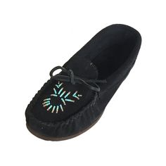 Description Details Sizing These women's authentic moccasin shoes are cute and dainty, offering the best combination of comfort and style. They are the perfect stylish casual shoes for slipping on and running out the door. They have a durable rubber sole with a slight heel that can be used for both indoor and outdoor use. These real suede ladies traditional moccasin shoes come in a chic black color that matches with any outfit. They have a turquoise hand-beaded design on the vamp which is beauti Fringe Moccasin Boots, Native American Moccasins, Black Moccasins, Soft Sole Slippers, Beaded Moccasins, Moccasin Shoes, Moccasins Women, Beaded Ankle, Sheepskin Slippers