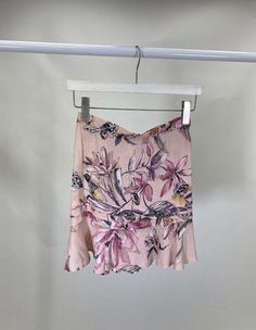 This Item is Final Sale. Meet the Mira! The printed mini skirt of our dreams. Featured in a flirty floral print with hues of purples, pinks, and reds, this mini is a must have. Pair with the Petal Top in Pink Mauve to create a matching set moment. Matching Purple Satin Skirt And Top, Luxury Summer Floral Print Mini Skirt, Affordable Feminine Mini Skirt, Purple Flower Mini Skirt, Mini Wrap Skirt Floral, Dusty Rose Pink Skirt, Red Floral Skirt, Printed Mini Skirt, Pink Maxi Skirt