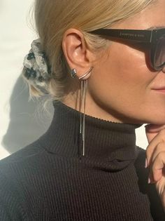 Introducing our exquisite Long Silver Earrings - a fine masterpiece exclusively crafted for you. Expertly handcrafted from high-quality stainless steel, this unique pair features three delicate minimal chains of varying lengths gracefully embraced by a seamless push back closure. The pièce de résistance lies in the stunning silver bar adorning the front, lending an extraordinary charm to the final creation. Lightweight and remarkably comfortable, these earrings epitomize elegance and are availab Minimalist Pierced Earrings For Evening, Elegant Silver Teardrop Wrap Earrings, Elegant Silver Drop Wrap Earrings, Elegant Silver Wrap Earrings, Elegant Metal Ear Climbers As A Gift, Silver Metal Ear Climbers For Party, Elegant Metal Pierced Ear Climbers, Formal Metal Drop Wrap Earrings, Elegant Metal Ear Climbers As Gift