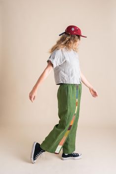 Stand out in our Patchwork Sunset Pants—a one-of-a-kind masterpiece crafted from a collection of cotton and linen fabric scraps we've carefully saved throughout the year. These unique pants are perfect for transitioning effortlessly between summer and fall, and back again. Stripe colors/fabrics will vary. Features: One-of-a-Kind Design: Each pair is a unique patchwork of carefully selected fabric scraps. Versatile Styling: Ideal for shifting seasons, blending summer ease with autumn warmth. Pull Wearable Sewing Projects, Striped Linen Pants Outfit, Between Summer And Fall, Jumpsuit And Cardigan, Colorful Pants, Unique Pants, Linen Pants Outfit, Striped Linen Pants, Patchwork Pants