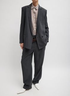 Crafted from a luxurious Italian fluid viscose, lightweight enough to transcend all seasons, The Fluid Suiting Double-Breasted Blazer fulfills all of your suiting jacket needs in one fell swoop. Paired back to the Trouser Short or Derrick Men’s Trouser in the same fabrication, this fresh take on suiting will fill the gaps of your wardrobe. Pair with our Skinlike mercerized wool brights—Red, Orange, and Green for a fun twist on these Ring 2 colorways. 93% Viscose 7% Polyester Style Number: F124FS Silk Suits For Fall Workwear, Silk Suits For Workwear In Fall, Tailored Silk Pantsuit For Workwear, Silk Notch Lapel Outerwear For Work, Silk Outerwear For Work, Silk Outerwear With Button Closure For Work, Silk Single-breasted Outerwear For Work, Classic Single-breasted Outerwear In Suiting Fabric, Tailored Single-breasted Solid Suit