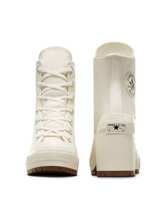 Converse Chuck Taylor 70s Deluxe heeled sneakers in white | ASOS White Low-top Platform Boots, White Boots With Rubber Sole For Streetwear, Modern White High-top Boots, White Sporty High-top Boots, White Low-top Boots With Rubber Sole, White Lace-up Boots With Rubber Sole, Modern White Low-top Boots, Sporty White Lace-up Boots, Modern White Boots With Rubber Sole