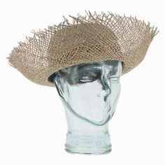 Modern Italian fashion meets beach/resort wear style in the Belfry Ariana. Loosely woven of all seagrass straw, the Ariana allows constant air flow for a cool and comfortable wearing experience. The deep brim sports an unfinished edge and natural straw is twisted and braided for a casual hat band. The brim of the Ariana is extremely flexible, allowing it to be worn in a variety of ways! *FINAL SALE FEATUREDStyle: Deep Brim ClocheMaterial: SeagrassDimensions: 4" Crown, 4" BrimBand: Twisted Straw Lightweight Beachy Straw Hat For Beach Season, Lightweight Coastal Straw Hat For Beach Season, Beachy Summer Straw Hat For Vacation, Beachy Straw Hat For Summer Vacation, Beachy Summer Vacation Straw Hat, Lightweight Bohemian Straw Hat For Beach, Beige Beachy Straw Hat For Beach, Lightweight Straw Hat For Beach, Lightweight Straw Hat For Beach Season