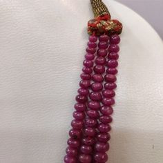 Natural AAA Ruby necklace 3 strands. Weight -454 caret Size of beads - 10mm to 3mm The necklace can be adjusted according to the neck size. Idol gift for women. Elegant Round Beaded Necklaces For Festivals, Traditional Double Strand Beads For Gift, Multi-strand Faceted Beads Pearl Necklace As Gift, Festive Gemstone Necklace With Round Beads, Festive Gemstone Beaded Necklace, Elegant Gemstone Beads Mala As Gift, Traditional Multi-strand Gemstone Bead Jewelry, Elegant Choker With Natural Stones And Round Beads, Elegant Choker With Round Natural Stones