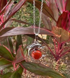 Dainty Red Jasper Dolphin Pendant Red Jasper Crystal Necklace Root Chakra Healing Due to its truly extraordinary metaphysical properties, red jasper stones are believed to be a one-stop-shop for manifesting courage, strength, and wisdom. In the same way that a beautifully rendered landscape echoes our complex, vast ecosystem, these unique gemstones remind us to consider the priceless planetary elements that give us life. The combination of minerals that give red jaspers stones their opaqueness a Spiritual Red Necklace With Natural Stones, Red Carnelian Spiritual Jewelry, Spiritual Red Coral Jewelry, Spiritual Red Round Pendant Jewelry, Spiritual Red Coral Jewelry As A Gift, Red Spiritual Round Pendant Jewelry, Red Spiritual Crystal Pendant Necklace, Spiritual Red Crystal Pendant Necklace, Red Natural Stone Crystal Pendant Necklace