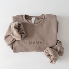 MAMA, DAD, AUNTIE, UNCLE, GRANDMA, GRANDPA custom embroidered crewneck sweatshirt, monochromic and neutral minimal modern design. This sweatshirt is unisex in size so fits slightly oversized. Material is lightweight and buttery soft fleece lined, perfect for year-round!  Bella + Canvas Fleece  material: Airlume Combed and Ring-spun cotton/polyester  Unisex, related fit (please refer to size guide in listing photos) Ribbed cuff and waistband If you would like something other than the listed embro New Mom Sweatshirt, Grandma And Grandpa Sweatshirts, Dad Crewneck Sweatshirt, Auntie Embroidered Sweatshirt, Mama And Mini Sweatshirts, Embroidered Sweatshirt Ideas, Auntie Aesthetic, Mama Embroidered Sweatshirt, Mama Crewneck Sweatshirt