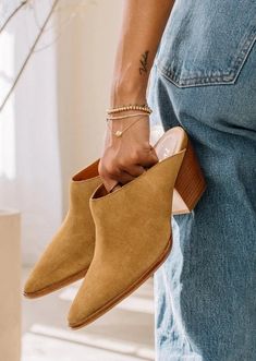 Hop on the TREND TRAIN with these super cute Pointed Toe Suede Mules. The color is chef's kiss for fall. Comfortable enough for all day wear, these new mules from Matisse will become your go to this season. The heel is not too high and the style is perfect. If you live in the south, this will be a good shoe for most of the winter. Suede upper Manmade outsole 2.5 in/6.35 cm heel Textile lining Padded insole Leather stacked heel Imported Floral Dress Casual, Suede Mules, Black Short Dress, Boot Accessories, Wedge Sneakers, Dress With Cardigan, Dressy Casual, The Trend, Floral Dress Black