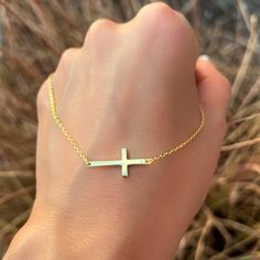 ✞ This dainty necklace features a sleek, minimalist sideways cross, offering a modern take on a classic symbol. Crafted with fine attention to detail, the cross delicately rests along a slender chain, creating a subtle yet meaningful statement. Lightweight and versatile, this necklace is perfect for layering or wearing solo for a touch of understated elegance. A timeless piece that effortlessly blends faith and style, making it an ideal accessory for any occasion. Rose Gold Chain Necklace, Pearl Gifts, Gold Necklace Simple, Simple Rose, Dainty Gold Necklace, Rose Gold Chain, Understated Elegance, Religious Gifts, Cuff Earrings