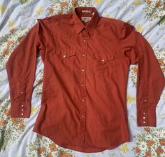 Sheplers Vintage Orange Rodeo Shirt Size medium Burnt orange western rodeo shirt (B29) Vintage Shirt For Rodeo In Fall, Vintage Shirt For Western-themed Fall Events, Red Western Style Tops For Ranch, Vintage Red Tops For Rodeo, Vintage Short Sleeve Shirt For Rodeo, Vintage Long Sleeve Shirt For Western-themed Events, Brown Rodeo Shirt With Button Closure, Brown Button-up Shirt For Rodeo, Vintage Button-up Shirt For Rodeo