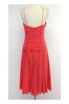 Size 10 Pink ruched dress Body 98% Silk 2% Spandex Lining 1 100% Acetate Lining 2 100% Silk Made in the USA Concealed back zip Ruched bodice Tie at bust Loose and flowing skirt Underarm to underarm 16" Waist 31" Roomy hip area Total length 44" Fitted Evening Dress With Ruched Bodice For Cocktail, Fitted Midi Dress With Smocked Back, Stretch Cocktail Dress With Ruched Bodice, A-line Party Dress With Ruched Back, Prom Dress With Ruched Back, Midi Length, Midi Prom Dress With Ruched Back, Ruched Midi Dress With Fitted Waist, Midi Length Prom Dress With Ruched Back, Ruched Bodice A-line Dress