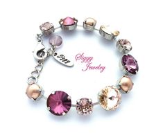 Sweet Paris is a romantic Swarovski crystal tennis bracelet featuring Genuine Swarovski crystals in warm pink and blush tones alternating with Swarovksi rose gold pearls. The crystal sizes are 12mm rivolis and 8mm chatons. The bracelet is available in the following nickel-free finishes. A. Rhodium (shown) B. Antique silver C. Rose gold D. Gold Please include a note to seller when you check out with your desired finish. If a note is not included, a finish will be selected for you. Matching earrin Adjustable Pink Bracelets For Anniversary, Pink Hypoallergenic Bracelets For Wedding, Elegant Pink Hypoallergenic Bracelet, Adjustable Pink Crystal Bracelet For Wedding, Elegant Pink Crystal Bracelet For Valentine's Day, Pink Rose Quartz Round Bracelet, Purple Hand-strung Crystal Round Bracelet, Adjustable Hand-strung Pink Crystal Bracelet, Adjustable Nickel-free Pink Crystal Bracelet