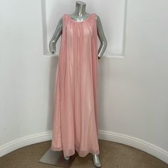 Amelia Couture Dress Size: 4, 6, 8 Color: Pink Salmon Shell: 100% Polyester Lining: 100% Polyester Netting: 100% Nylon Style #305 Dry Clean Size 4: Pit To Pit: 17”Length: 56” Size 6: Pit To Pit: 17.5”, Length: 56” Size 8: Pit To Pit: 18”, Length: 56” Size 6 And 8 Are New With Tag Size 4 New Without Tag Sheer Chiffon Summer Evening Dress, Sheer Chiffon Evening Dress For Summer, Sheer Chiffon Dress For Summer Evenings, Sheer Evening Dress For Summer Formal Events, Sheer Chiffon Evening Dress, Spring Silk Chiffon Pre-draped Dress, Elegant Sheer Chiffon Summer Dress, Sheer Chiffon Floor-length Dress, Flowy Feminine Georgette Maxi Dress