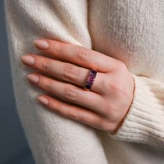 This ring is perfect for a lover of pink and purple hues! This 5 stone ring features one center pink sapphire flanked by light and dark amethyst stones set on a gold band. Embrace color and live vibrantly with this stunning ring! Available in 14K Yellow Gold Pink Sapphire weight = 0.72 carats Light and dark Amethyst weight - 2.20 carats Band width = 6.4mm and tapers to 3.4mm, based on a size 7 Gemstones are natural, therefore colors may vary Purple Ruby Ring For Anniversary In Fine Jewelry Style, Pink Multi-stone Amethyst Ring, Purple Ruby Ring For Anniversary, Purple Ruby Anniversary Ring With Birthstone, Classic Purple Ruby Wedding Ring, Amethyst Ring With Pink Sapphire Accent Stones For Anniversary, Purple Ruby Ring With Accent Stones For Anniversary, Purple Three Stone Fine Jewelry Rings, Purple Pink Sapphire Promise Ring