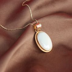 "Real Mother of Pearl Necklace 14k Gold Raw White Nacre Oval Necklace Vintage Style Boho Necklace Handmade Jewelry Christmas Gift For Women ▶ 𝙋𝙍𝙊𝘿𝙐𝘾𝙏 𝙁𝙀𝘼𝙏𝙐𝙍𝙀𝙎 * 14k Yellow Gold Mother of Pearl Necklace * Mother of Pearl Width : 1.23 cm ( 0.48 in) * Mother of Pearl Lenght : 1.75 cm ( 0.68 in) * Mother of Pearl Necklace Total Size : 1.55 cm x 2.38 cm ( 0.61 x 0.93 in) * Mother of Pearl Necklace Height: 4.95 mm ( 0.19 in) * Available in 5 different chain lengths: 42cm (16.5 in), 44cm Oval Pendant Necklaces With Cabochon For Wedding, Oval Pendant Cabochon Necklace For Wedding, Gold Oval Cabochon Jewelry As A Gift, Oval Cabochon Pendant Necklace For Weddings, Gold Oval Cabochon Jewelry Gift, Wedding Necklaces With Oval Cabochon Pendant, Exquisite 14k Gold White Necklace, Classic White Oval Pendant Jewelry, High Luster Oval White Gold Jewelry