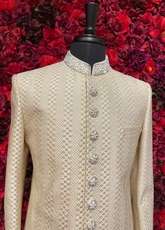 The Darpan Sherwani exudes sophistication with its elegant ivory tone and intricate textured pattern. This timeless sherwani is a perfect choice for weddings and formal celebrations, offering a regal look with unmatched craftsmanship. Key Features: Elegant Design: Ivory sherwani with detailed textured patterns. Premium Fabric: Crafted with high-quality materials for comfort and style. Customizable Accessories: Dupatta, mojari, safa, and jewelry can be tailored to your preference. Color - Ivory W Classic Long Sleeve Traditional Formal Wear, Designer Off-white Bandhgala For Eid, Designer Off-white Bandhgala With Resham Embroidery, Classic Fitted Traditional Wear For Ceremonies, Designer Off White Kurta With Resham Embroidery, Designer Off White Festive Sets, Classic Formal Sherwani For Eid, Designer Bandhgala With Intricate Embroidery, Cream Nehru Jacket For Eid Reception