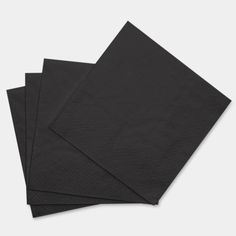 four black napkins on top of each other