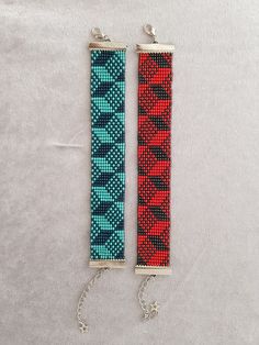 two pieces of beaded jewelry sitting on top of each other