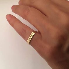 "Pinky ring, Engraved ring, Foreign Language, Initial Ring, Personalized Ring, Stacking Ring, name ring The ring made of Best quality 18k Gold Plate over sterling silver or syerling silver Engraved letter/s, word, name in any language Choose your size , and your word / name - in any language let me know in the \"note to seller\" during checkout what you want. The product will arrive to you packed in gift box and padded envelope to maintain the product Our jewelry are water resistant and comes wi Simple Gold Engraved Ring For Anniversary, Minimalist Custom Name Engraved Ring For Promise, Adjustable Promise Ring With Engraved Text, Gold Minimalist Ring With Custom Name Engraving, Minimalist Gold Engraved Ring With Custom Name, Yellow Gold Hand Stamped Promise Ring, Simple Personalized Gold Rings, Gold Engraved Hand Stamped Promise Ring, Gold Hand Stamped Engraved Promise Ring