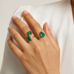 Take your style to the next echelon with the Green Goddess Ring from our Envy collection. Handcrafted by our expert jewelry artisans, the ring is made from 925 sterling silver plated in 14K gold for a hypoallergenic and stunning finish. The showstopping emerald fusion stone glistens with an abundance of beauty that adds an opulent touch. Finished with cubic zirconia, it creates an old-money look while being affordably priced. Metal: 925 Silver Plating: 14K Gold E-coated Size: 6-9 Adjustable Ston Luxury Classic Teardrop Emerald Ring, 14k Gold Emerald Ring With Vs Clarity, Luxury Gemstone Open Ring Jewelry, Luxury Polished Emerald Jewelry, Vs Clarity Emerald Ring In Fine Jewelry Style, Timeless Cubic Zirconia Emerald Promise Ring, Luxury Emerald Pear-shaped Jewelry, Luxury Pear-shaped Emerald Jewelry, Fine Jewelry Pear-shaped Emerald Ring Vvs Clarity