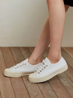 Editor's NotesBENSIMON's shoes are casual and inspired by the my own little music bar theme.- Eye-catching stitching detail- Easy slip-on design- Basic sneakers style- Vegan materials- Logo print on the front- Neutral and minimal styleMeasurements(in.)- Size: KR 220MM (US 5) ~ KR 260MM (US 9)- Heel Height: 1.18in.*Fits true to size. If you are wearing with an insole, order a size up.Composition & Care- Organic cotton- Outsole: cork, rubber- Footbed: sugar cane- Avoid direct heat and moisture- Professional cleaning is recommended Designer- by BENSIMON Spring Cotton Slip-on Sneakers With Rubber Sole, Casual Slip-on Canvas Shoes With Rubber Toe Cap, Sporty Canvas Sneakers With Stitched Sole, Everyday Spring Sneakers With Round Toe, Everyday Low-top Sneakers For Summer, Sporty Everyday Comfortable Sneakers, Summer Everyday Low-top Sneakers, Everyday Summer Low-top Sneakers, Slip-on Sneakers With Flat Heel For Everyday