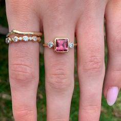 We adore the cut of this vibrant Pink Tourmaline, set with brilliant cut 3mm diamonds in yellow 14k gold with a handhammered band. Perfect as an alternative engagement ring or just to add a pop of color to your life. Approximate stone size: 7mm x 7mm TCW tourmaline: 1.93ct TCW diamonds: .20ct This one of a kind piece is handmade with love in Emily's Hudson Valley studio. If you have questions about sizing, shipping or need help deciding please reach out to us! Alternative Engagement Ring, Pink Tourmaline Engagement Ring, Colored Stone Engagement Rings, Stacked Engagement Ring, Birthstone Stacking Rings, Pink Tourmaline Ring, Diamond Shop, Tourmaline Ring, Alternative Engagement Rings