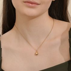 Embrace 'Happy Easter!' through an enchanting 18k gold-plated necklace crafted with elegance, a symbol of 'Hope you have an egg-cellent time!'. 18K Gold-Plated Nickel, Lead, and Cadmium Free Product Code: M0045GN Collection: Occasion Type: Short Chain Material: Stainless Steel Dimensions: Adjustable from 41cm to 46cm Pendant Dimensions: Style: Includes: Gold Oval Pendant Charm Necklace For Gift, Gold Oval Pendant Charm Necklace For Anniversary, Gold Oval Pendant Jewelry Gift For Her, Oval Gold Necklaces As A Gift For Her, Oval Pendant Yellow Gold Necklace For Her, Oval Drop Necklace Fine Jewelry Gift, Elegant Oval Pendant Drop Necklace For Gift, Yellow Gold Oval Pendant Necklace For Her, Gold Drop Necklace With Birthstone Teardrop Pendant