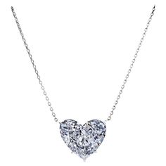 This breathtaking pendant features a GIA Certified 3.00 carat heart-cut diamond, suspended on a sleek platinum chain. With its near perfect colorlessness, this E graded diamond exudes a captivating brilliance and refined beauty. A gem of superior clarity, this Internally Flawless diamond has only surface-level blemishes, making it truly remarkable. The diamond’s excellent polish and very good symmetry ensure maximum light reflection, enhancing it's sparkle from every angle. It's lack of fluoresc Heart Shaped Diamond Pendant, Platinum Necklace, Round Diamond Pendant, Platinum Chain, Romantic Necklace, Heart Shaped Pendant Necklace, Family Jewellery, Antique Pendant, Vintage Necklaces