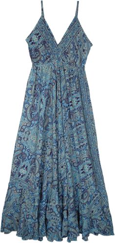 An effortless, exquisite blue paisley print that dances gracefully across the fabric.  This print is a harmonious blend of different shades of blue, creating a visual masterpiece that's both captivating and soothing. #tlb #Sleeveless #vacationclothing #beachwrap #Floral #Printed #SilkDress #SareeSilkDress Blue Hippie Dress, Vintage Beach Dress, Blue Paisley Dress, Coastal Cowgirl Dress Outfit, Blue Boho Dress, Dress Saree, Blue Summer Dress, Beach Floral, Maxi Long Dress