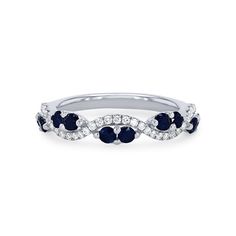 a white gold ring with blue sapphires and diamonds