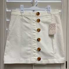 Brand New Free People Skirt With Tags! White Denim With Brown Buttons Up Front And Cute Detailing Down Back. Great For Summer Or Even Adorable With A Sweater. Please Reach Out With Questions Or Offers. Fitted Cotton Mini Skirt With Button Closure, Trendy White Mini Skirt For Fall, Cotton Mini Denim Skirt With Button Closure, Mini Cotton Denim Skirt With Button Closure, Cotton Denim Mini Skirt With Button Closure, Spring Cotton Button-up Bottoms, White Mini Skirt For Fall Day Out, White Cotton Mini Denim Skirt, White High Waist Cotton Denim Skirt