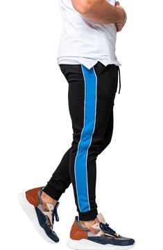 Athleisure is reinvented in these comfy joggers that leave others in the dust with supersoft fleece, bold side stripes and a skinny fit. Elastic/drawstring waist Front scoop pockets 92% cotton, 8% elastane Hand wash, dry flat Made in Turkey Relaxed Fit Three Stripes Sweatpants For Jogging, Relaxed Fit Athleisure Joggers With Three Stripes, Sporty Sweatpants With Side Stripes And Relaxed Fit, Blue Sports Sweatpants With Elastic Side Panels, Relaxed Fit Joggers With Side Stripes For Jogging, Blue Sporty Joggers With Ribbed Waistband, Sporty Relaxed Fit Sweatpants With Side Stripes, Relaxed Fit Side Stripes Athleisure Activewear, Relaxed Fit Athleisure Activewear With Side Stripes