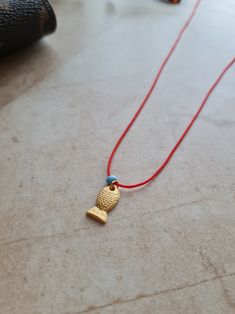 🌙 Handcrafted 14k gold plated dainty adjustable red string necklace 🌙 All materials used are tarnish free and durable 🌙 Best gift for your friends and family or just for yourself 🌙 Regular shipping takes approximately 10-15 business days depending on your country. Express shipping takes 3-5 business days. Please choose express shipping if you want to receive your package faster 🌙 I do offer combined shipping. Please feel free to contact me for custom orders and combined shipping orders 🌙 Although my products are durable and tarnish free, you better keep them away from excessive water and chemicals, perfumes etc. 🌙 For more jewelries don't forget to check my store: https://www.etsy.com/shop/MiniMoonDesign Dainty Red Necklace With Lobster Clasp, Adjustable Red Necklace With Cord, Red Fish-shaped Jewelry Gift, Adjustable Red Glass Necklace, Adjustable Hand-strung Red Coral Necklace, Jewelry Choker, Handmade Necklaces, Charm Necklace, Gold Plate