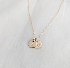 Each tiny charm measures 3/8" (9.5mm). One is personalized with a tiny heart design, the other, an initial of your choice. Available in solid .925 sterling silver or 14k gold fill. Material and chain length can be made from the drop down menu. Please leave me a note in the personalization box with the initial you would like. Necklace With Heart, Tiny Charm, Tiny Heart, Initial Charm, Charm Gift, Initial Necklace, Heart Design, Solid 925 Sterling Silver, Chain Length