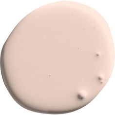 an image of the top of a white paint bottle with small dots on it's surface